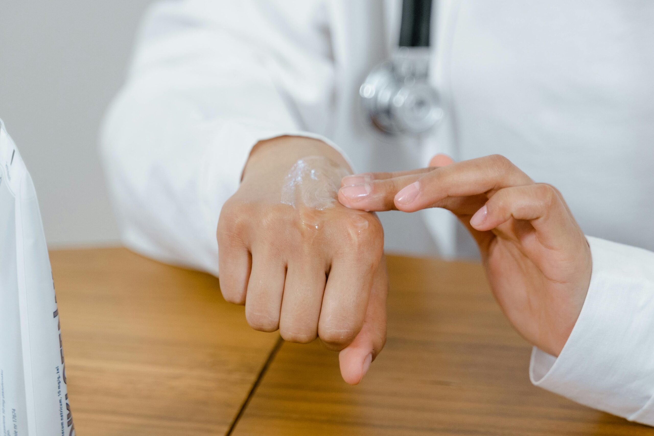 Applying cream to the back of the hand for skin care Applying cream to the back of the hand for skin care